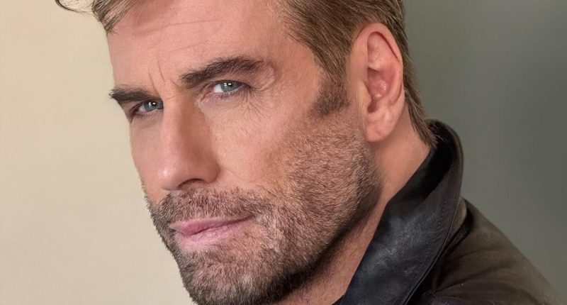 John Travolta transforms into Danny Zuko during  Grease concert