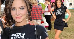 Just in case anyone forgets! Tulisa wears her own The Female Boss T-shirt as she curls new hair on second day of V Festival