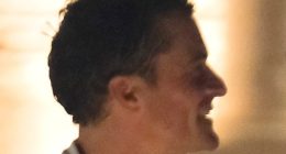 Katy Perry's ex Orlando Bloom hangs with mystery woman at Bezos party