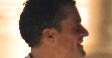 Katy Perry's ex Orlando Bloom hangs with mystery woman at Bezos party