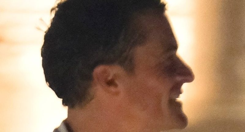 Katy Perry's ex Orlando Bloom hangs with mystery woman at Bezos party