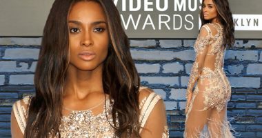 Keeping her Goodies covered! Ciara stands out at the VMAs in daring sheer dress with feathered hemline