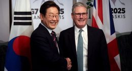 South Korean President Lee Jae-myung and British Prime Minister Keir Starmer shaking hands at a bilateral meeting.