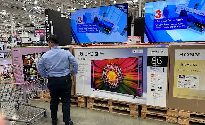 Key inflation gauge rose last month while Americans cut back on spending