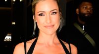 Kristin Cavallari's oiled-up chest almost spills out of dress