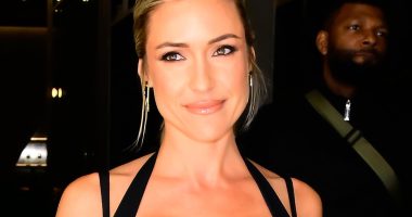 Kristin Cavallari's oiled-up chest almost spills out of dress