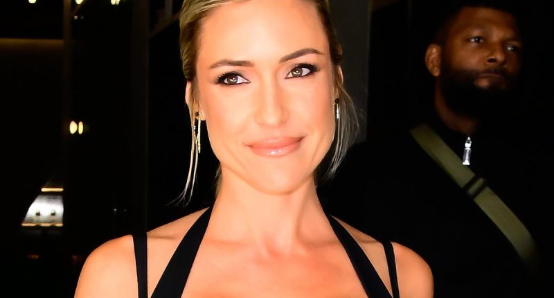 Kristin Cavallari's oiled-up chest almost spills out of dress