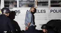 LA fights back with protesters zip-tied and loaded onto buses en masse