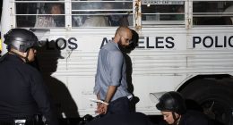 LA fights back with protesters zip-tied and loaded onto buses en masse