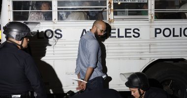 LA fights back with protesters zip-tied and loaded onto buses en masse
