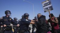 California Highway Patrol officers clash with protesters on Tuesday, June 10, 2025, in Los Angeles. (AP Photo/Eric Thayer)