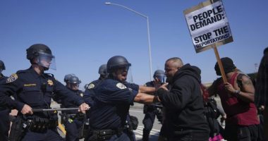 California Highway Patrol officers clash with protesters on Tuesday, June 10, 2025, in Los Angeles. (AP Photo/Eric Thayer)