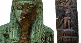 Ancient Egyptian artifacts: a statue and a fragment.