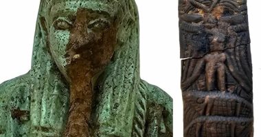 Ancient Egyptian artifacts: a statue and a fragment.