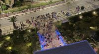 Aerial view of a crowd of people gathered at night.