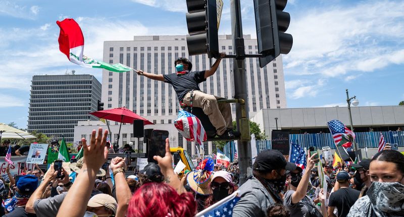 Man 'intentionally' drives into crowd at Virginia 'No Kings Day' rally
