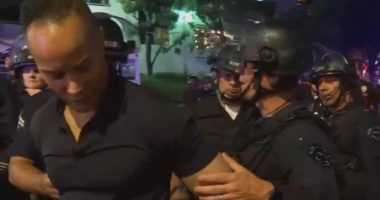 Moment CNN host realizes reporter is being detained by LAPD