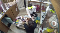 CCTV footage has captured the moment a man stole more than  $100,000 worth of jewellery from a family-run store in the Sydney CBD.