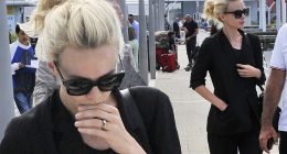 Mulling things over? Carey Mulligan looks deep in thought as she arrives at Venice Film Festival dressed in a chic black suit