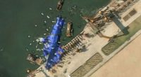 Mystery 'balloons' swarm stricken North Korean warship