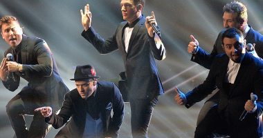 'N Sync are BACK! Boyband steal the show as they join Justin Timberlake on stage at  MTV VMAs