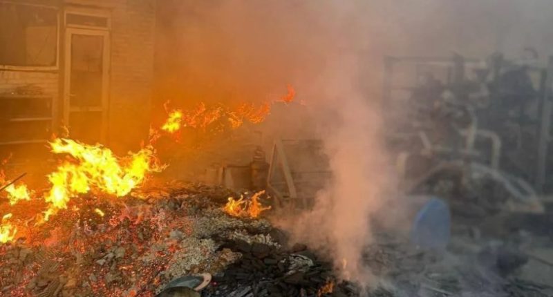 Fire at a Ukrainian factory following a Russian attack.