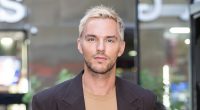 Nicholas Hoult looks unrecognisable as he strolls around New York City