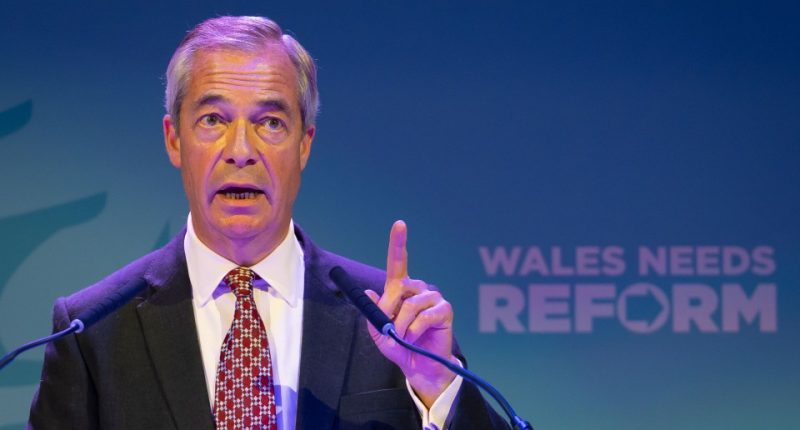 Nigel Farage speaking at a Reform UK event in Port Talbot, Wales.