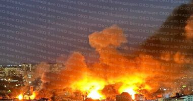 Fire and smoke engulf buildings in Kyiv and Odesa following a Russian attack.