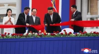 North Korea's Kim cuts tape at coastal tourist site; foreigners not yet welcome