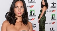 Olivia Munn dazzles in a strapless cleavage-baring dress