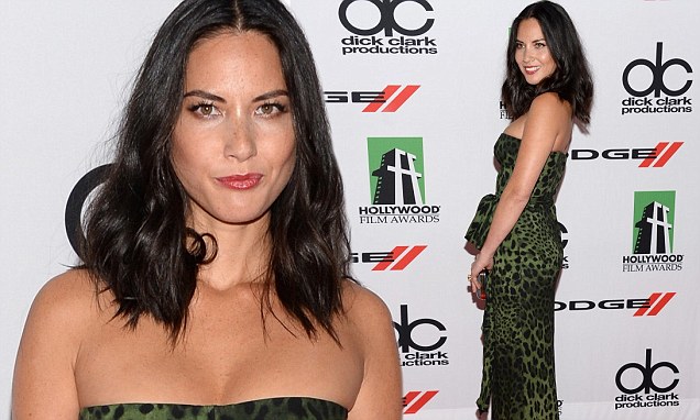 Olivia Munn dazzles in a strapless cleavage-baring dress
