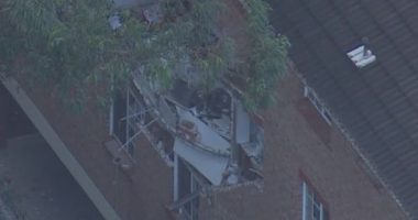 One hospitalised after gas explosion blows wall apart in Sydney apartment block