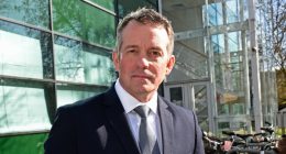 Man in suit outside the Internet Watch Foundation.
