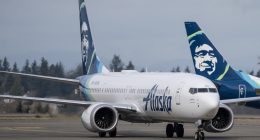Passenger in custody after 'direct threat' to airplane shuts down Seattle Airport runways