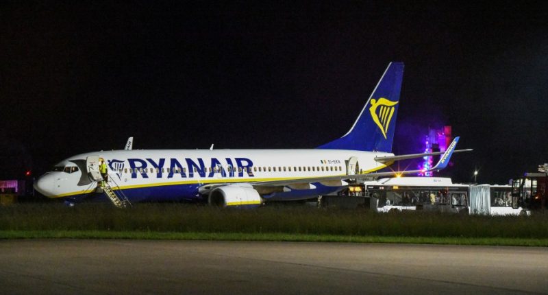 Ryanair passenger jet on the tarmac after experiencing turbulence.