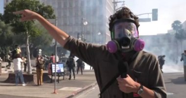 Police deploy tear gas at L.A. protest near federal building