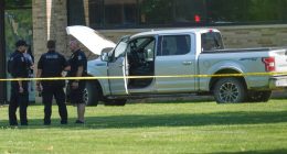 Police say a man opened fire outside a church before staff fatally shot him, averting mass shooting