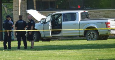 Police say a man opened fire outside a church before staff fatally shot him, averting mass shooting