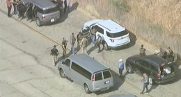 Protest at Dodger Stadium gets underway as immigration agents seen nearby amid reports of more ICE raids in LA County