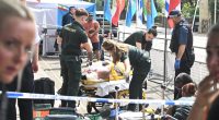 Paramedics attending to a protester injured outside the Iranian embassy.
