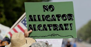 Protesters line highway to oppose Trump's 'Alligator Alcatraz'