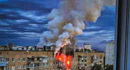 Smoke billowing from a burning building in Kharkiv, Ukraine, after an airstrike.