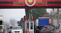 Cars waiting in line at a Transnistria-Moldova border crossing.