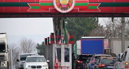 Cars waiting in line at a Transnistria-Moldova border crossing.