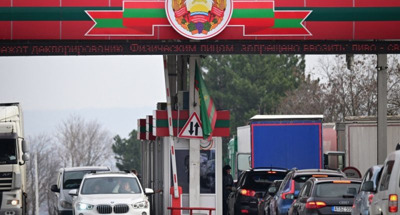 Cars waiting in line at a Transnistria-Moldova border crossing.