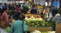 General photo of people shopping for fruits and vegetables at the Queen Vic Market on Friday 2, December 2023. inflation consumer economy