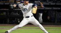 Rays pitcher carted off field and taken to hospital after foul ball into dugout hits him in face