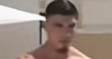 Revealed: Yob who knocked woman out with a chair during wild Ibiza poolside brawl is controversial footballer who scored in Wembley final just three weeks ago
