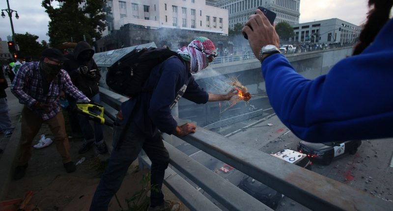 Rioters smash windows at LAPD headquarters as anti-ICE agitators clash with authorities